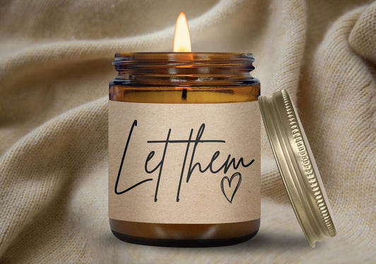 a candle that is sitting on a blanket