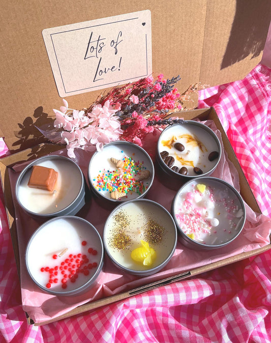 Dessert style decorated candles in a gift box